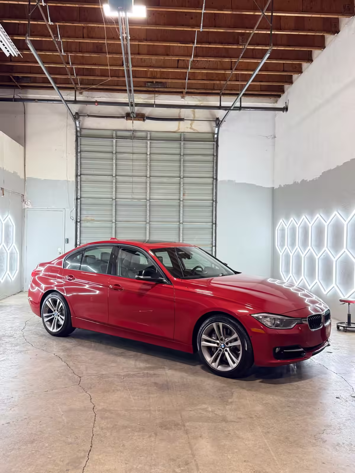 Red BMW after window tint service at Simplex